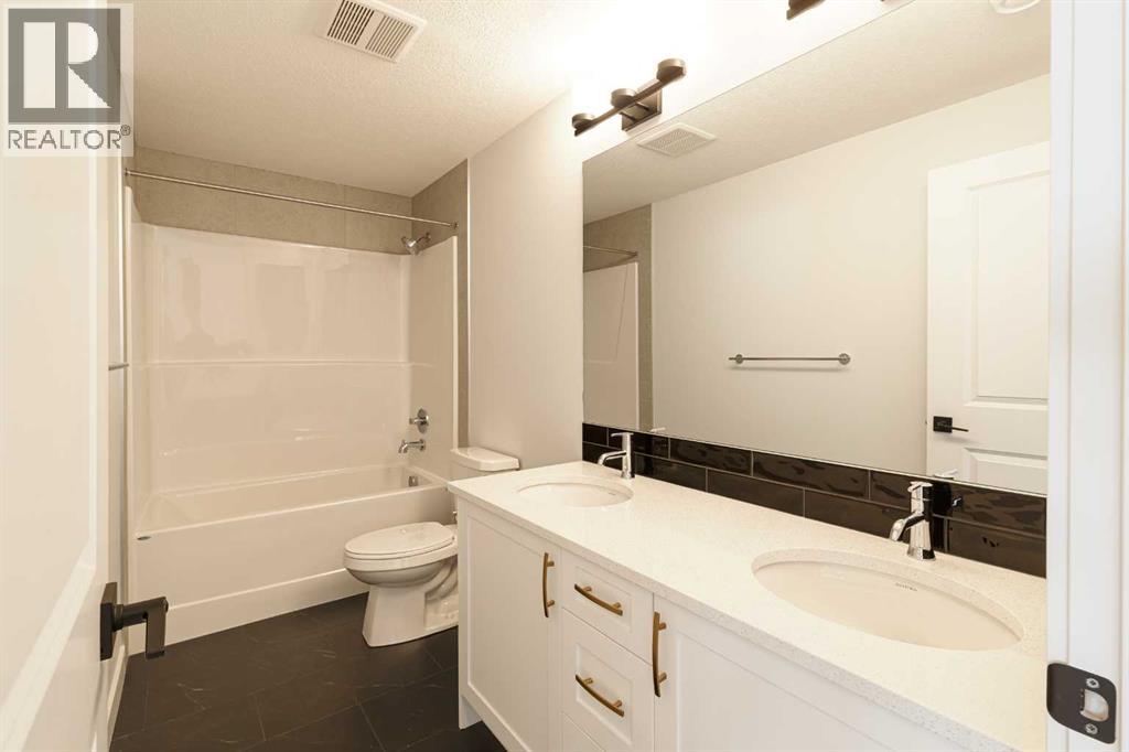 125 Monarch Bend, Rural Rocky View County, Alberta  T3Z 0K4 - Photo 27 - A2302248