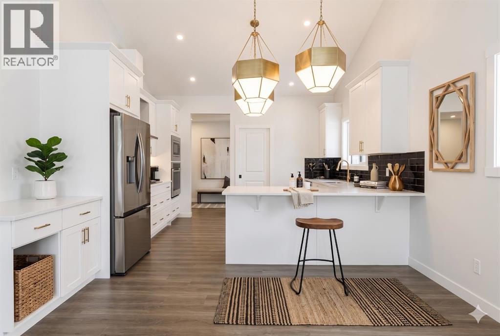 125 Monarch Bend, Rural Rocky View County, Alberta  T3Z 0K4 - Photo 9 - A2302248