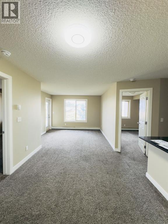 207, 355 Taralake Way Ne, Calgary, Alberta  T3J 0M1 - Photo 3 - A2304466