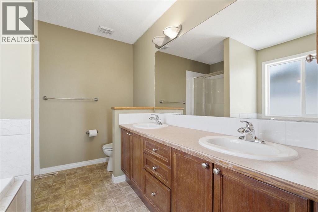 12 Crystal Shores Place, Okotoks, Alberta  T1S 2G3 - Photo 25 - A2302441