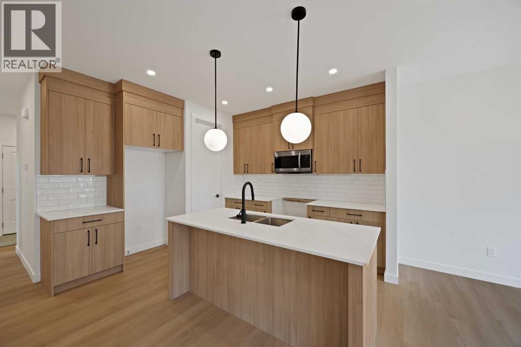 82 Heritage Circle, Cochrane, Alberta  T4C 3G9 - Photo 11 - A2304448