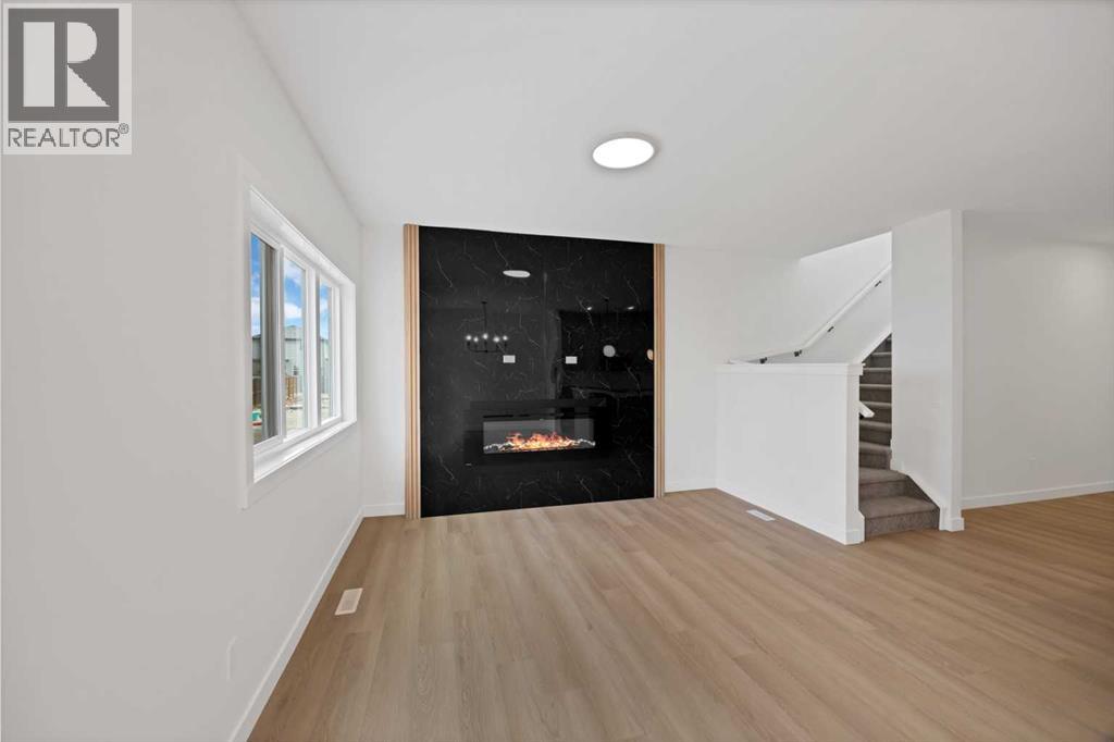 82 Heritage Circle, Cochrane, Alberta  T4C 3G9 - Photo 14 - A2304448