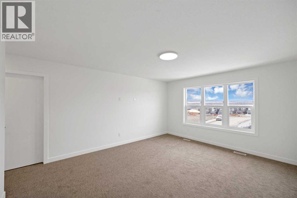 82 Heritage Circle, Cochrane, Alberta  T4C 3G9 - Photo 18 - A2304448