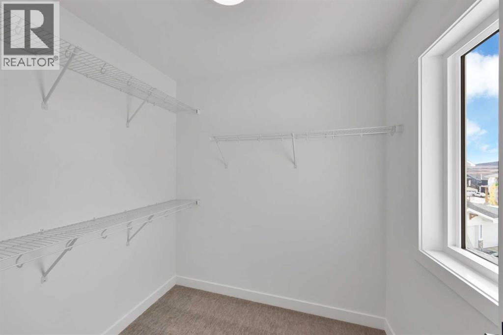 82 Heritage Circle, Cochrane, Alberta  T4C 3G9 - Photo 22 - A2304448