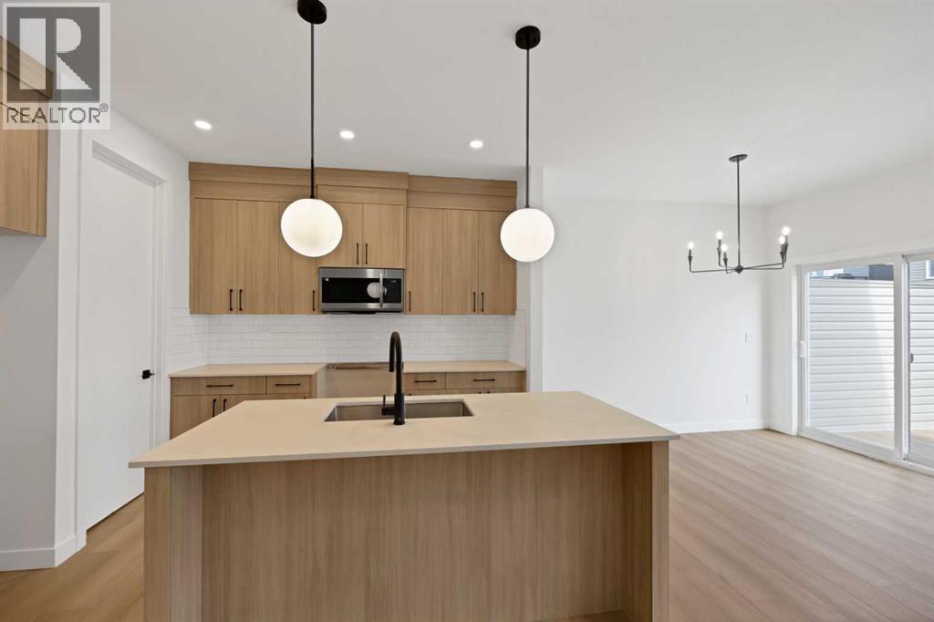 82 Heritage Circle, Cochrane, Alberta  T4C 3G9 - Photo 9 - A2304448