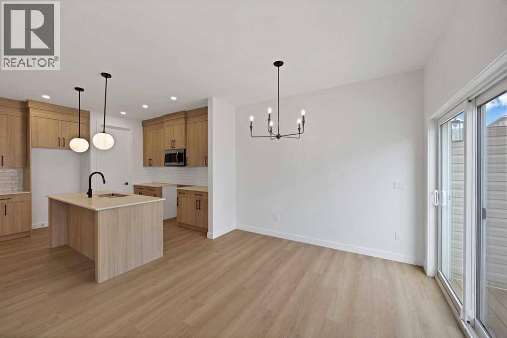 82 Heritage Circle, Cochrane, Alberta  T4C 3G9 - Photo 12 - A2304448