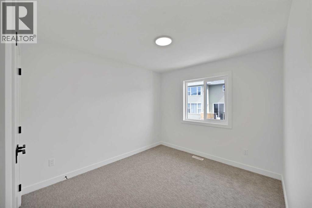 82 Heritage Circle, Cochrane, Alberta  T4C 3G9 - Photo 26 - A2304448