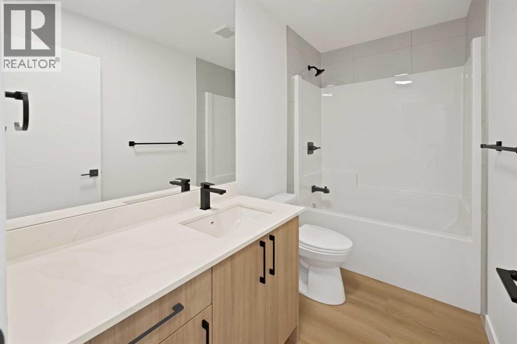 82 Heritage Circle, Cochrane, Alberta  T4C 3G9 - Photo 23 - A2304448