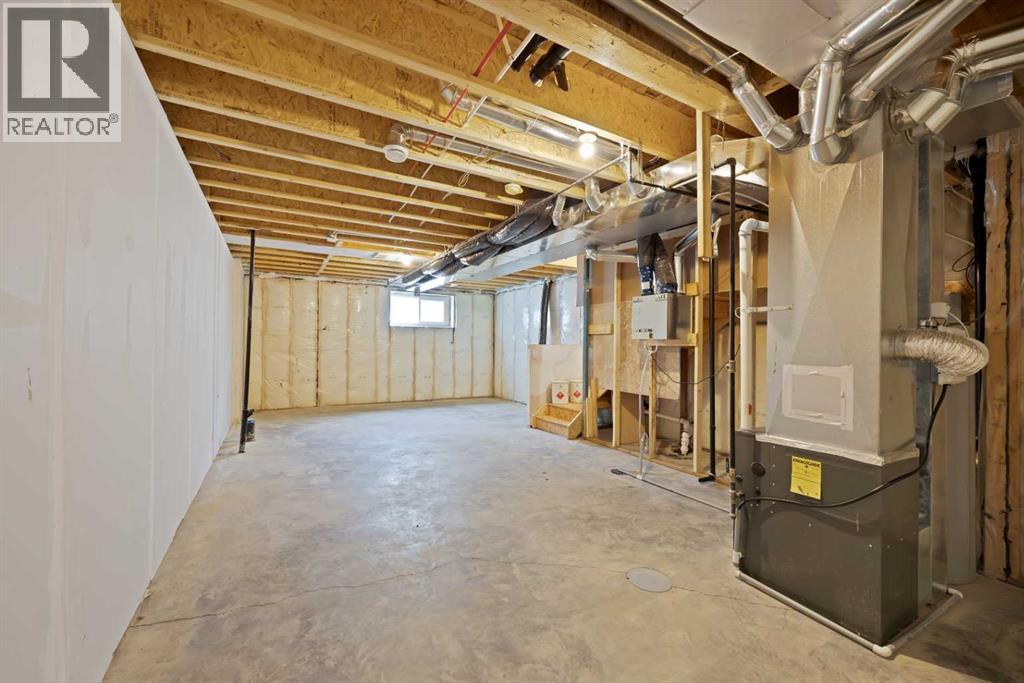 82 Heritage Circle, Cochrane, Alberta  T4C 3G9 - Photo 36 - A2304448