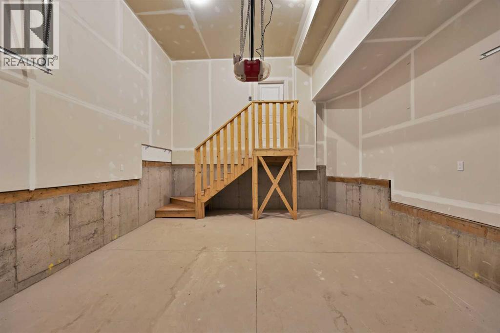 82 Heritage Circle, Cochrane, Alberta  T4C 3G9 - Photo 37 - A2304448