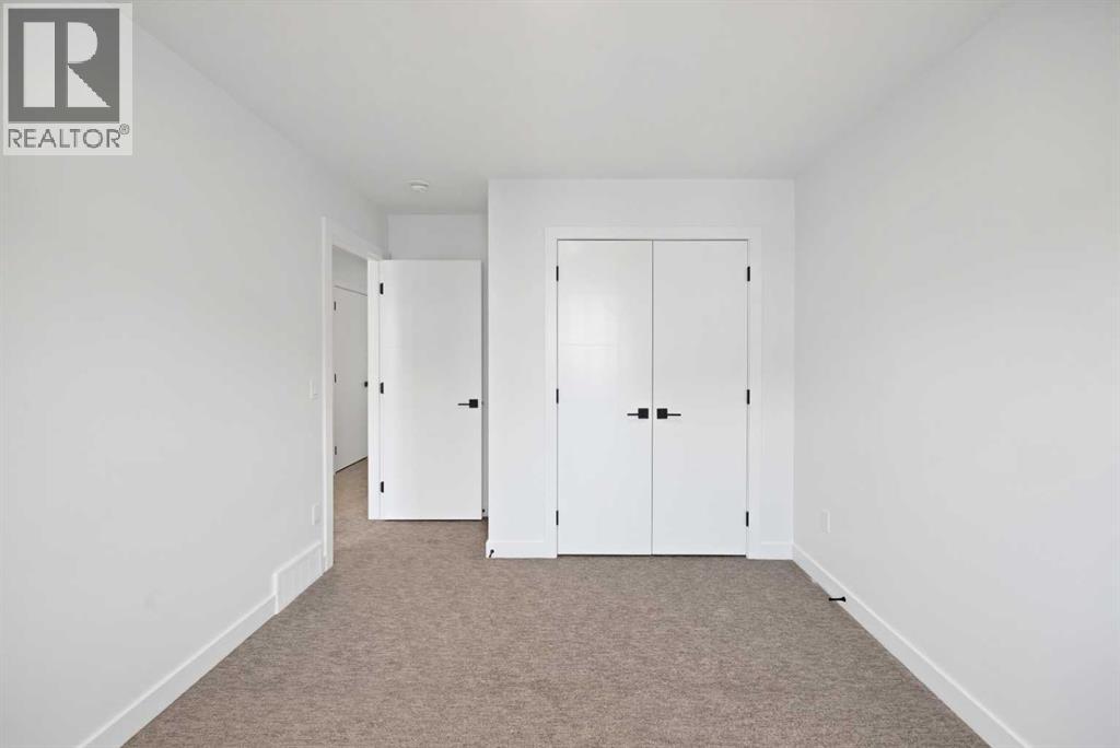 82 Heritage Circle, Cochrane, Alberta  T4C 3G9 - Photo 25 - A2304448