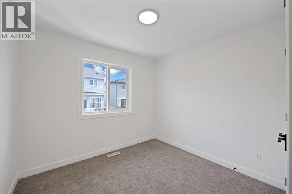 82 Heritage Circle, Cochrane, Alberta  T4C 3G9 - Photo 28 - A2304448