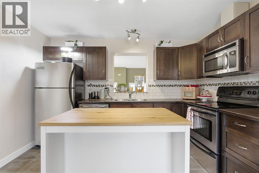 71 Cimarron Vista Gardens, Okotoks, Alberta  T1S 0G3 - Photo 12 - A2303911