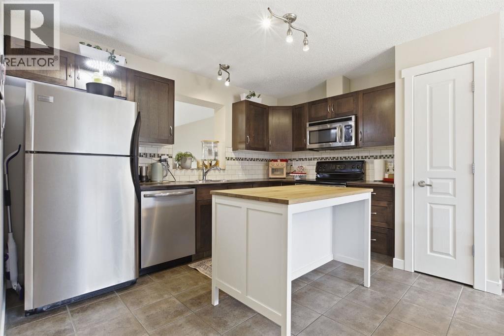 71 Cimarron Vista Gardens, Okotoks, Alberta  T1S 0G3 - Photo 11 - A2303911