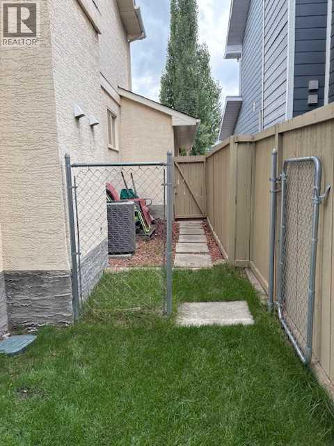 5 Woodmark Place SW, Calgary, Alberta  T2W 6A2 - Photo 47 - A2304368