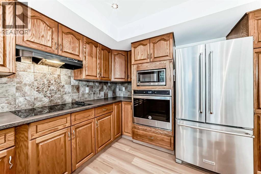 5 Woodmark Place SW, Calgary, Alberta  T2W 6A2 - Photo 15 - A2304368