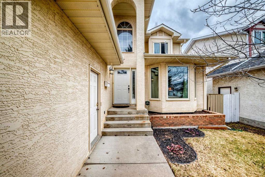 5 Woodmark Place SW, Calgary, Alberta  T2W 6A2 - Photo 2 - A2304368