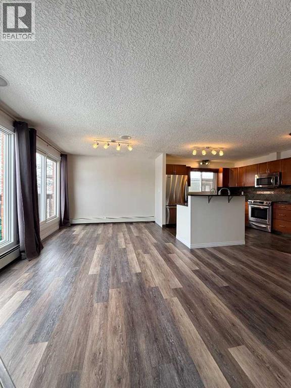 135 27 Avenue NE, Calgary, Alberta  T2Z 1Z8 - Photo 5 - A2295701