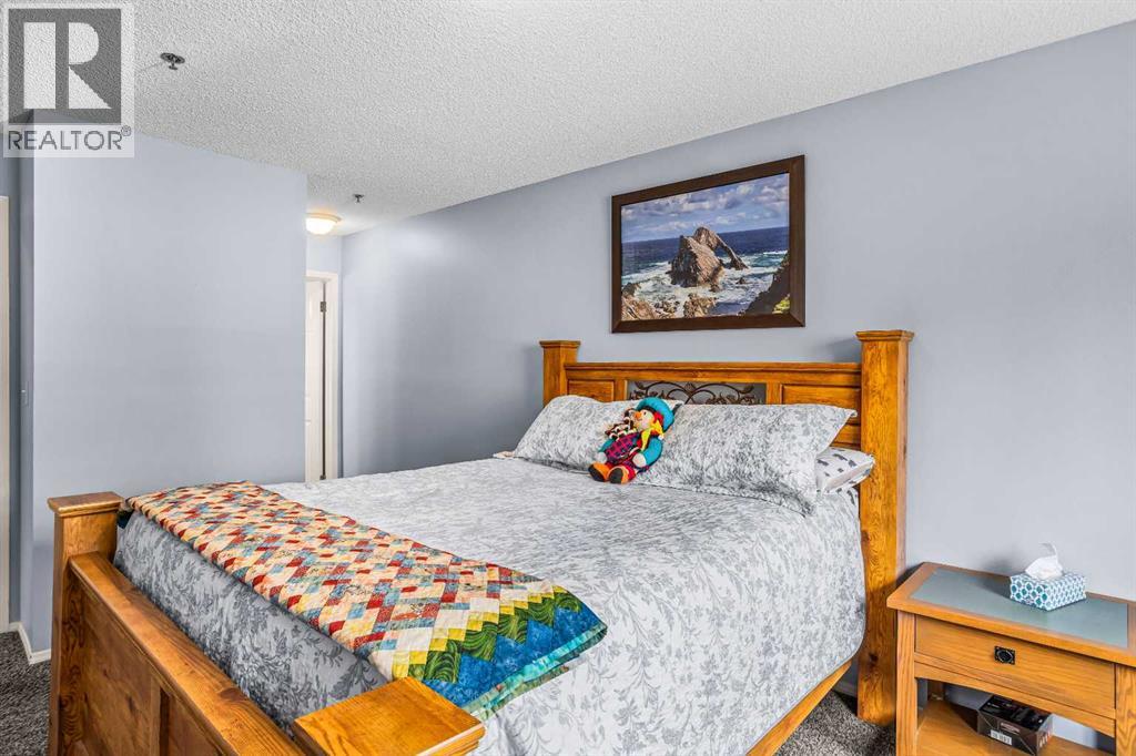 104, 1080a Cougar Creek Drive, Canmore, Alberta  T1W 1A4 - Photo 24 - A2305202