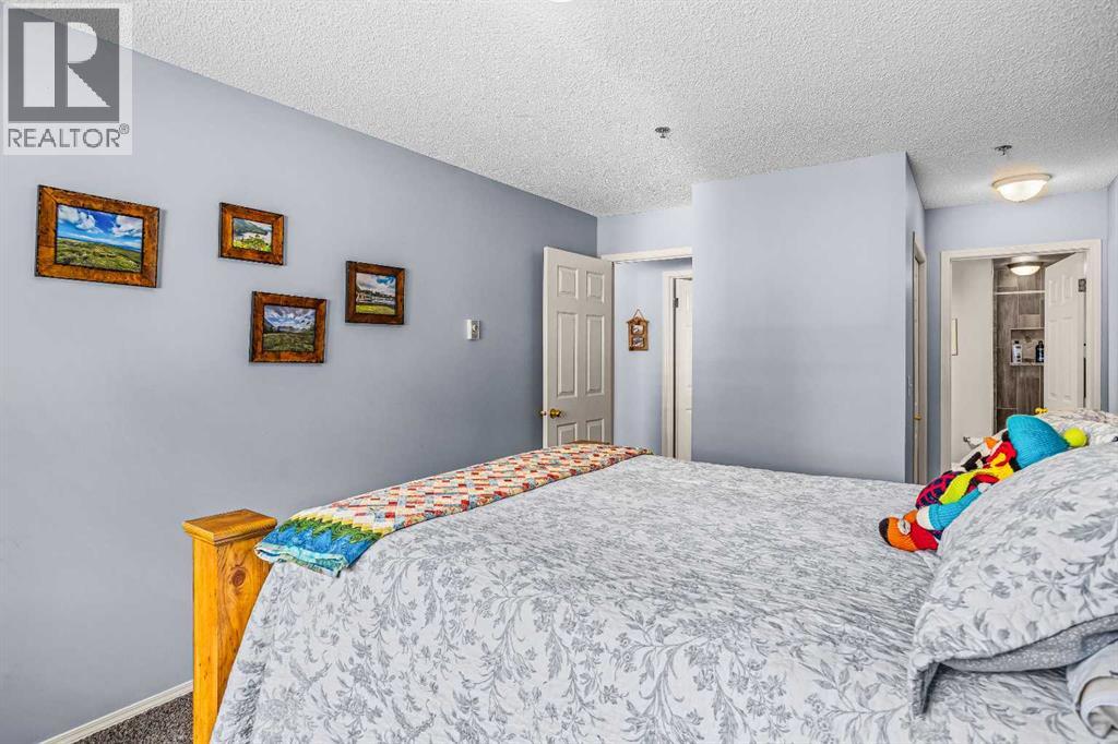 104, 1080a Cougar Creek Drive, Canmore, Alberta  T1W 1A4 - Photo 25 - A2305202