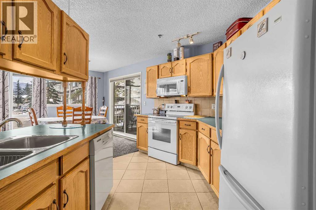 104, 1080a Cougar Creek Drive, Canmore, Alberta  T1W 1A4 - Photo 3 - A2305202