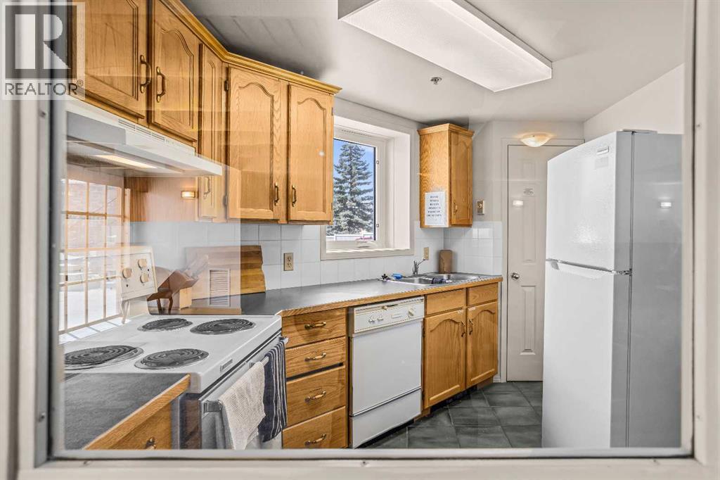 104, 1080a Cougar Creek Drive, Canmore, Alberta  T1W 1A4 - Photo 35 - A2305202