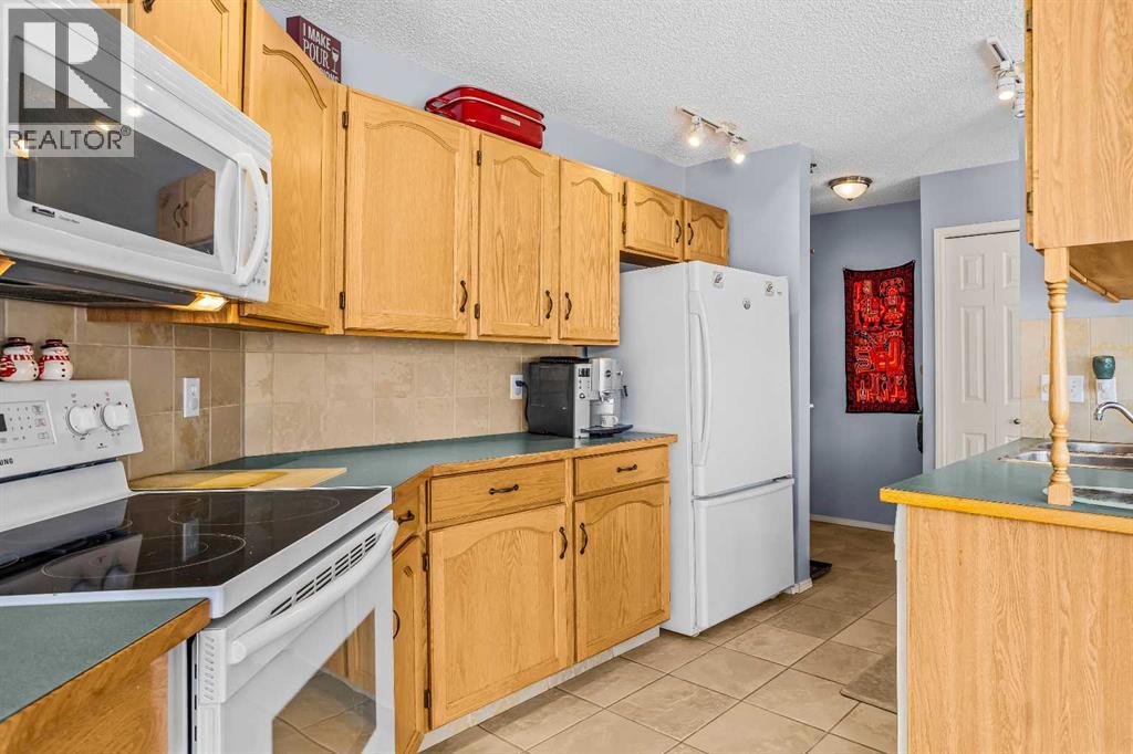 104, 1080a Cougar Creek Drive, Canmore, Alberta  T1W 1A4 - Photo 5 - A2305202