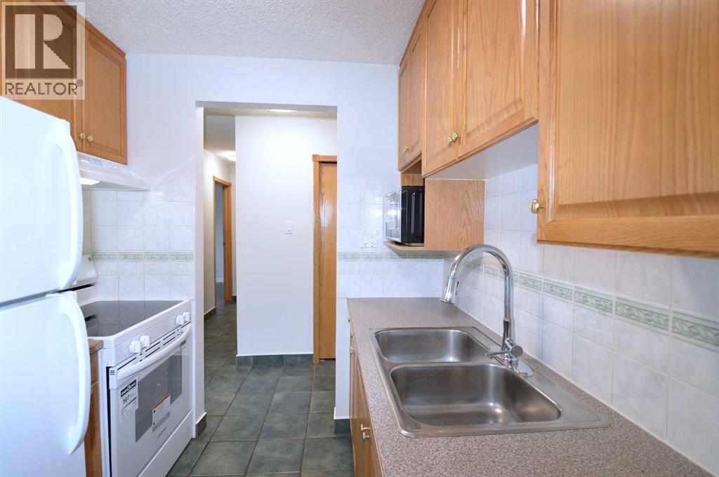 303, 635 56 Avenue Sw, Calgary, Alberta  T2V 0G9 - Photo 2 - A2287910