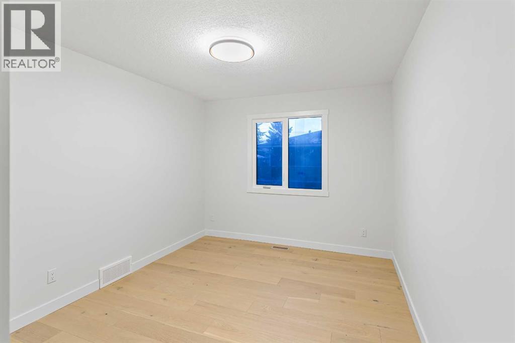 1731 111 Avenue SW, Calgary, Alberta  T2W 1R6 - Photo 20 - A2303259