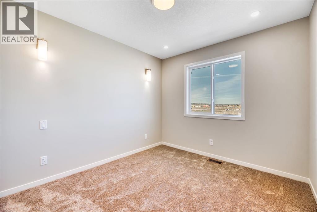 130 Royston Park Nw, Calgary, Alberta  T3L 0G9 - Photo 31 - A2301388