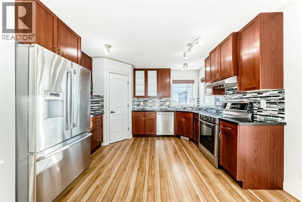 1156 Sherwood Boulevard NW, Calgary, Alberta  T3R 1P3 - Photo 4 - A2280119