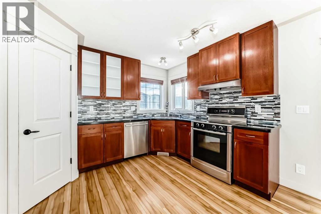 1156 Sherwood Boulevard NW, Calgary, Alberta  T3R 1P3 - Photo 5 - A2280119