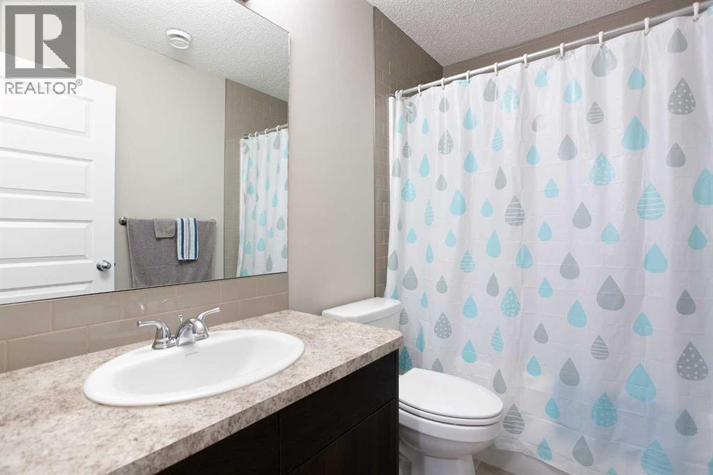 63 Heritage Court, Cochrane, Alberta  T4C 2N5 - Photo 34 - A2288398