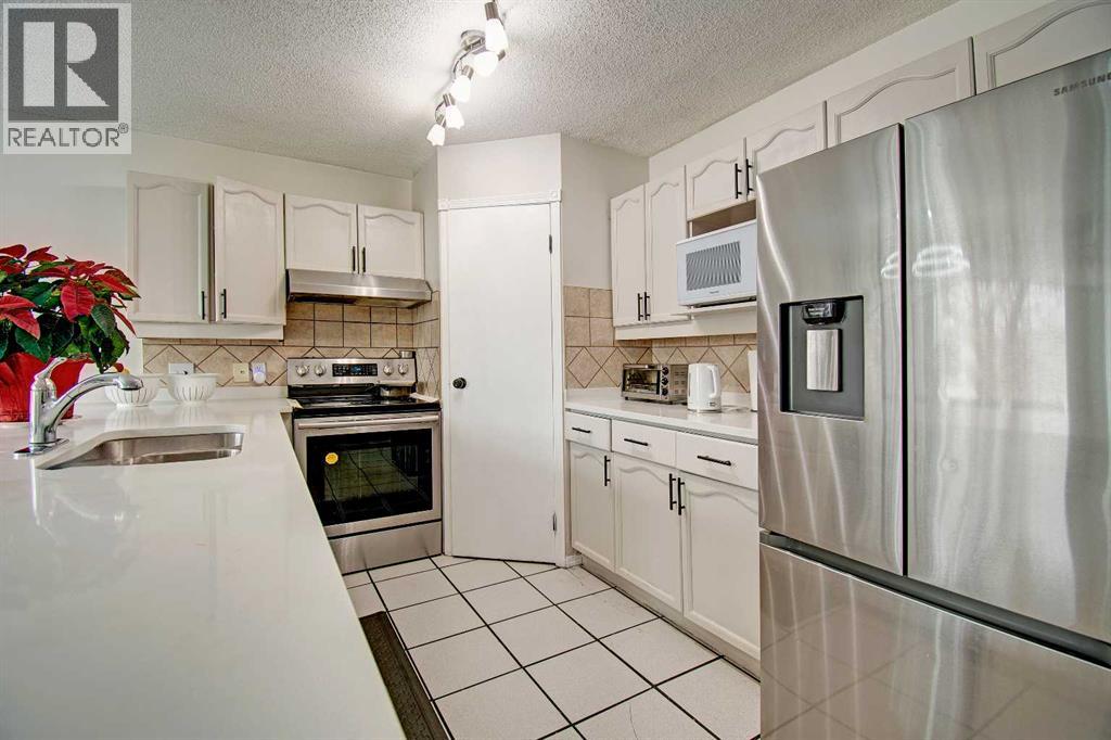 10316 Hidden Valley Drive Nw, Calgary, Alberta  T3A 4Z6 - Photo 8 - A2301053