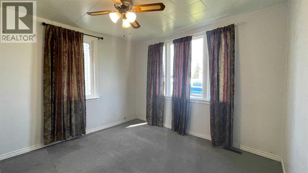 709 7 Avenue, Wainwright, Alberta  T9W 1B5 - Photo 10 - A2303843