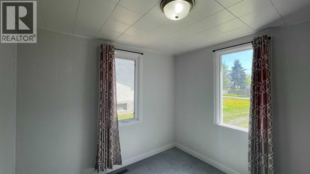 709 7 Avenue, Wainwright, Alberta  T9W 1B5 - Photo 12 - A2303843