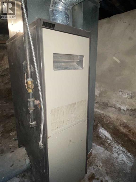 709 7 Avenue, Wainwright, Alberta  T9W 1B5 - Photo 20 - A2303843