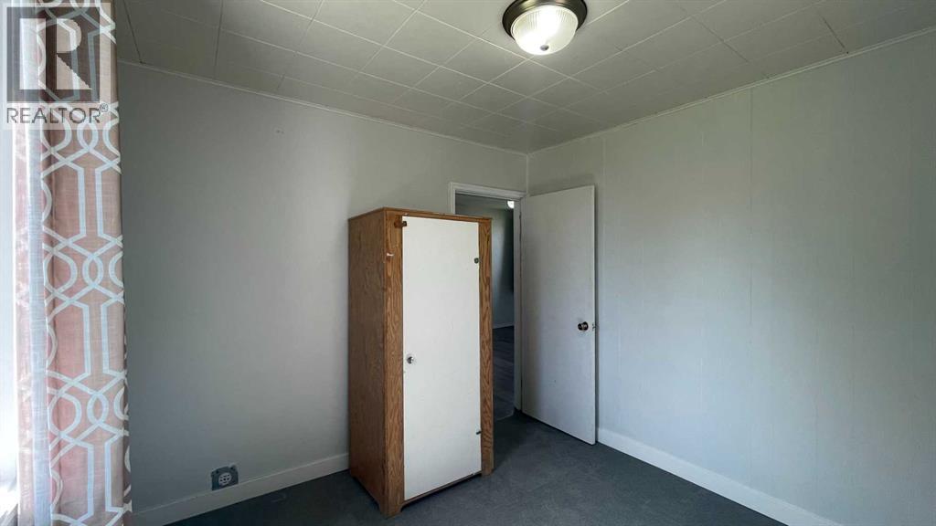 709 7 Avenue, Wainwright, Alberta  T9W 1B5 - Photo 13 - A2303843