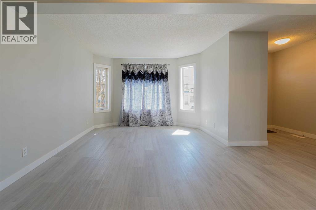 41 Los Alamos Crescent Ne, Calgary, Alberta  T1Y 7E9 - Photo 8 - A2304867