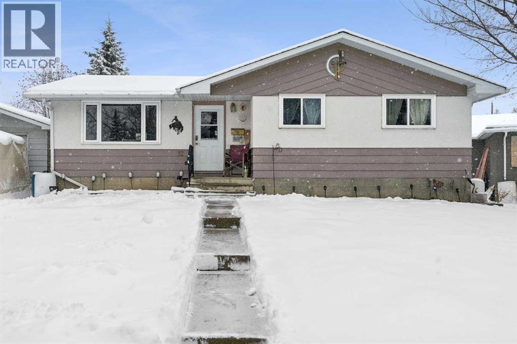 12 Westwood Crescent SW, Calgary, Alberta  T3C 2W6 - Photo 1 - A2298134