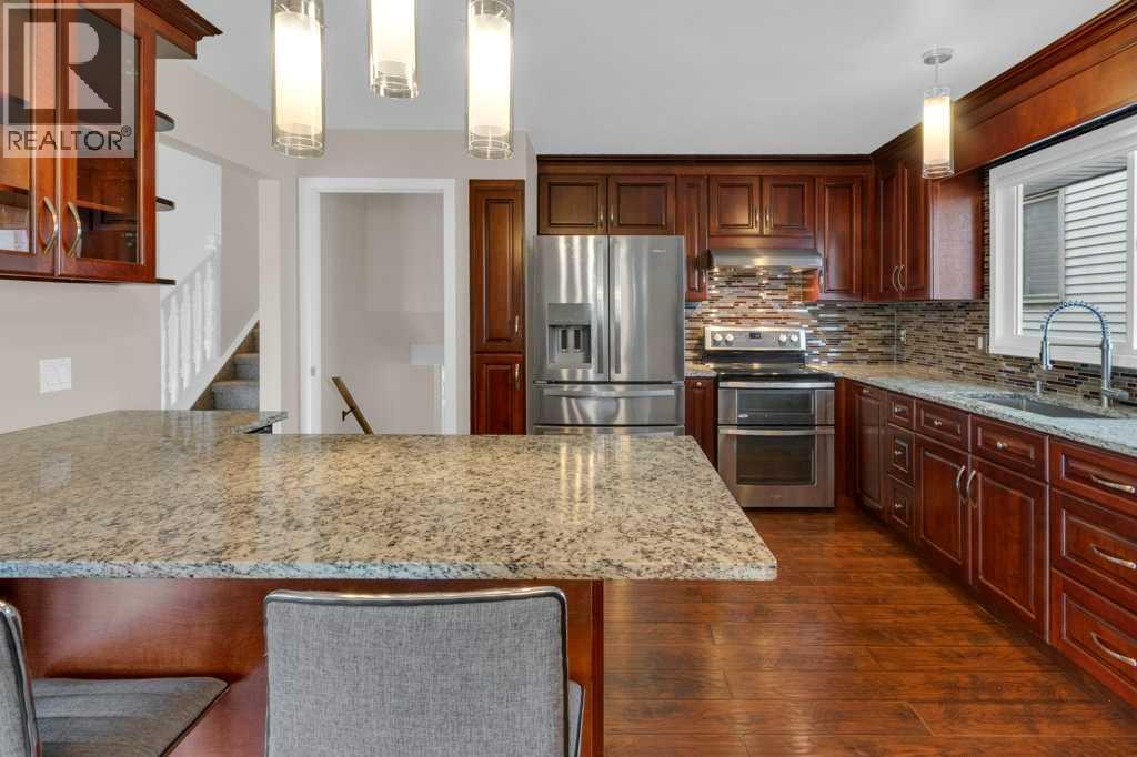 79 Scenic Way NW, Calgary, Alberta  T3L 1B4 - Photo 6 - A2304539