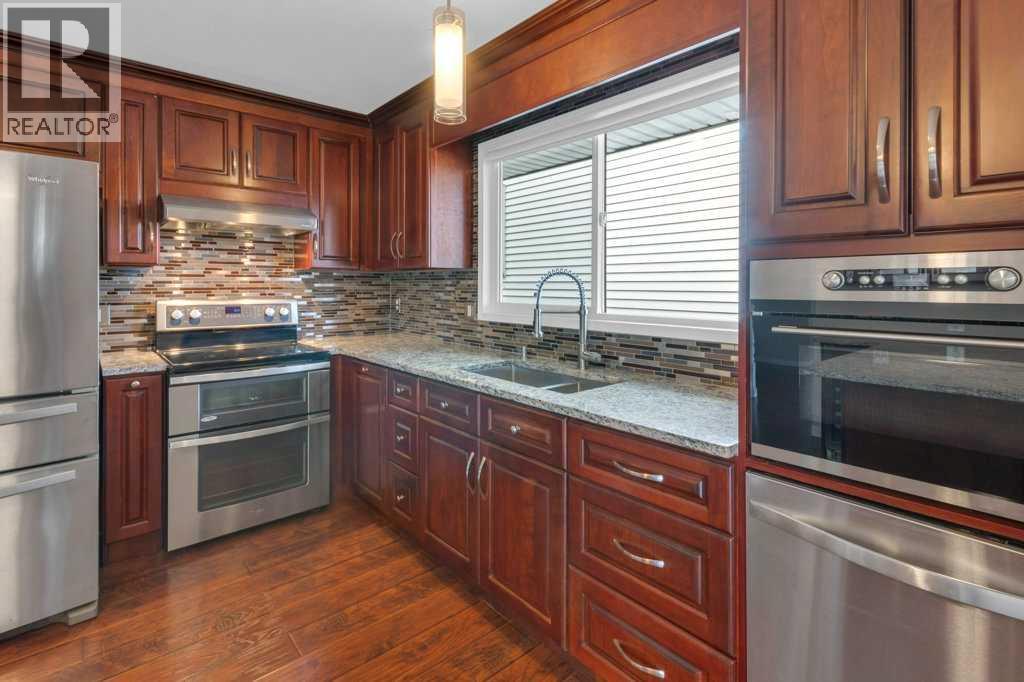 79 Scenic Way NW, Calgary, Alberta  T3L 1B4 - Photo 31 - A2304539