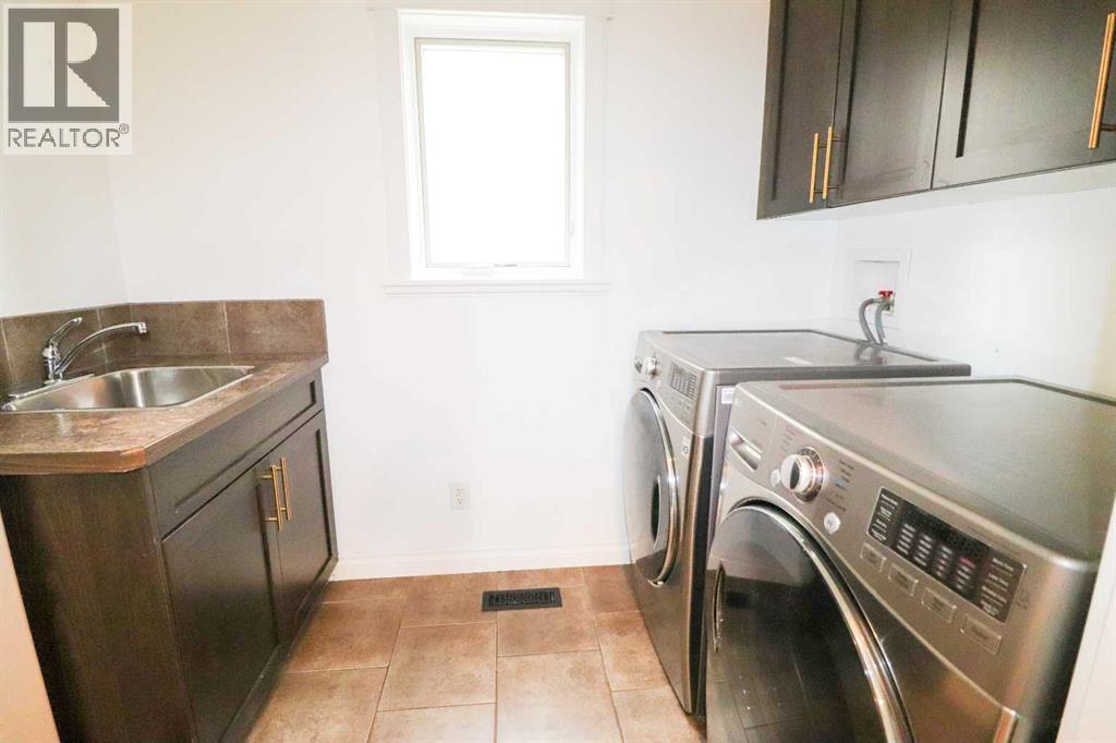 4 Heritage Point W, Lethbridge, Alberta  T1K 7Z4 - Photo 8 - A2302821