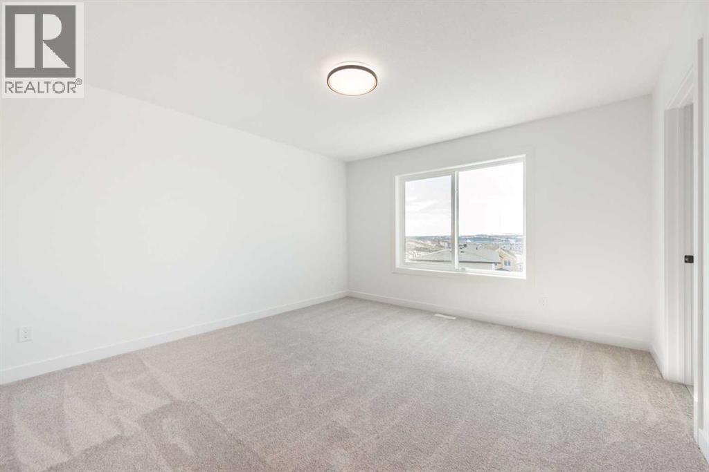 104 Heritage Manor, Cochrane, Alberta  T4C 3K8 - Photo 20 - A2304483