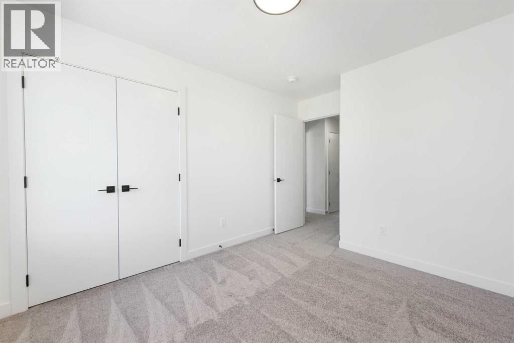 104 Heritage Manor, Cochrane, Alberta  T4C 3K8 - Photo 26 - A2304483