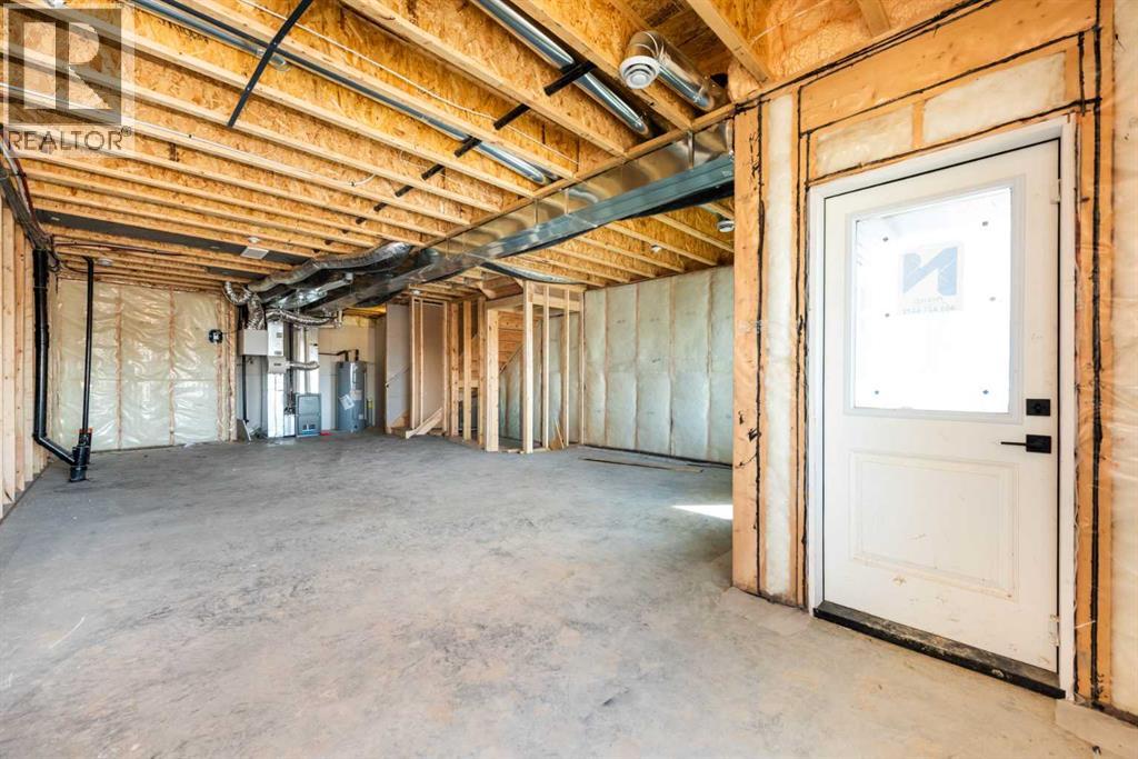 104 Heritage Manor, Cochrane, Alberta  T4C 3K8 - Photo 32 - A2304483