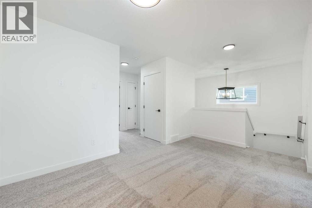 104 Heritage Manor, Cochrane, Alberta  T4C 3K8 - Photo 17 - A2304483