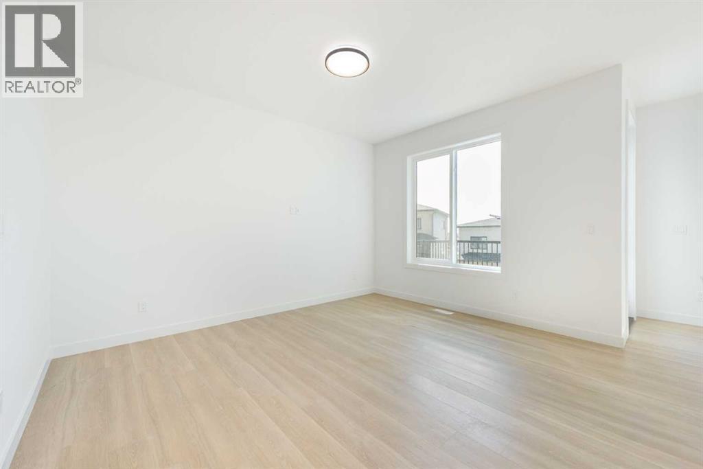 104 Heritage Manor, Cochrane, Alberta  T4C 3K8 - Photo 11 - A2304483