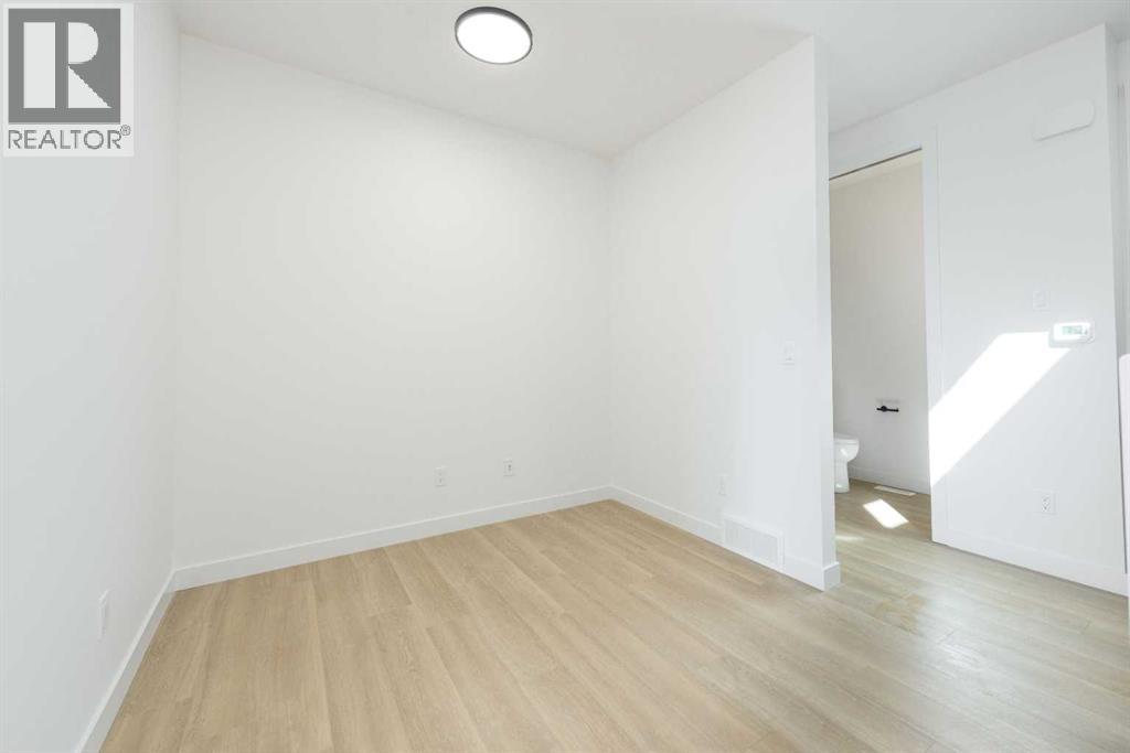 104 Heritage Manor, Cochrane, Alberta  T4C 3K8 - Photo 14 - A2304483