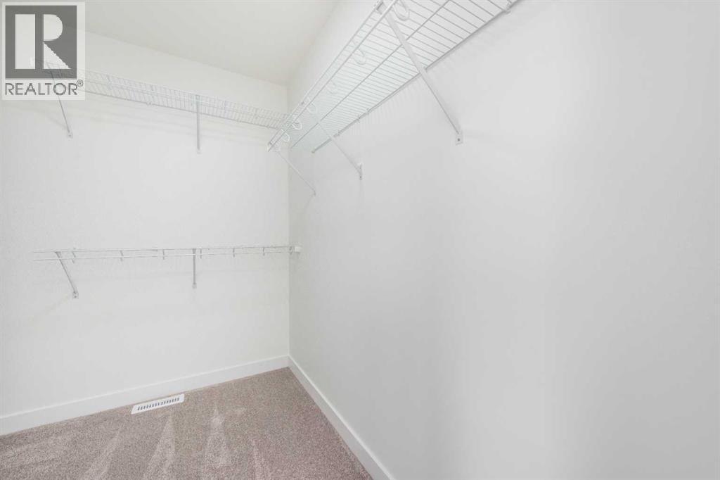 104 Heritage Manor, Cochrane, Alberta  T4C 3K8 - Photo 23 - A2304483